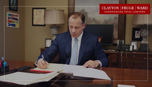 attorney sitting at desk